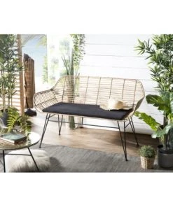 Magasin Méridiennes -Magasin Méridiennes canape 2 places en rotin naturel coussin noir pieds en metal 1